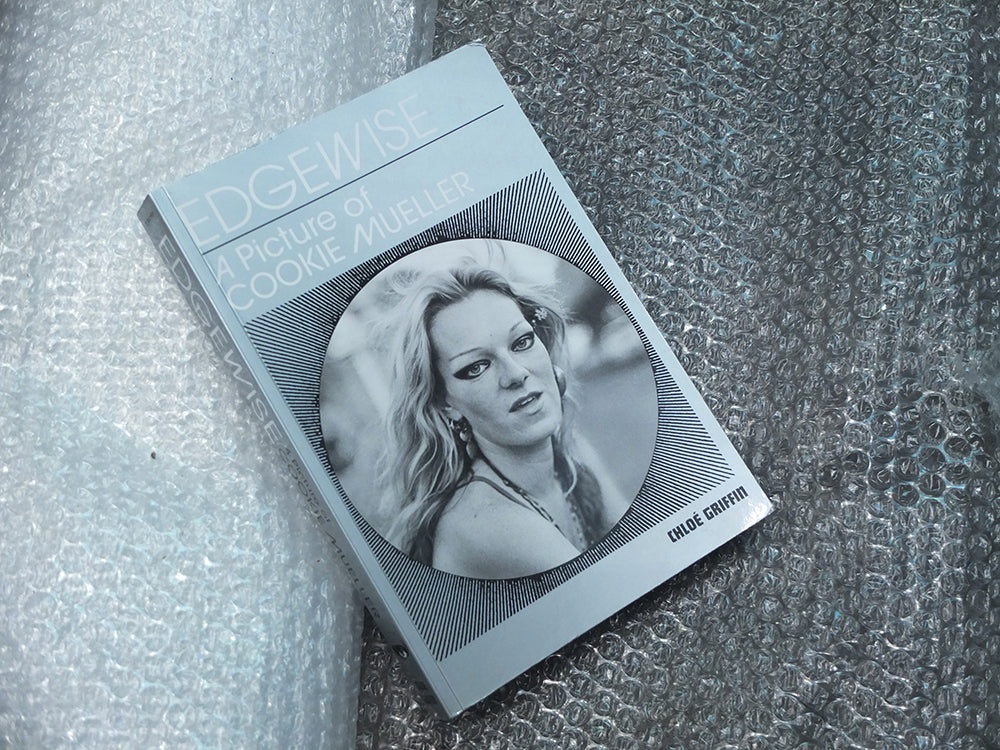 Edgewise. A picture of Cookie Mueller