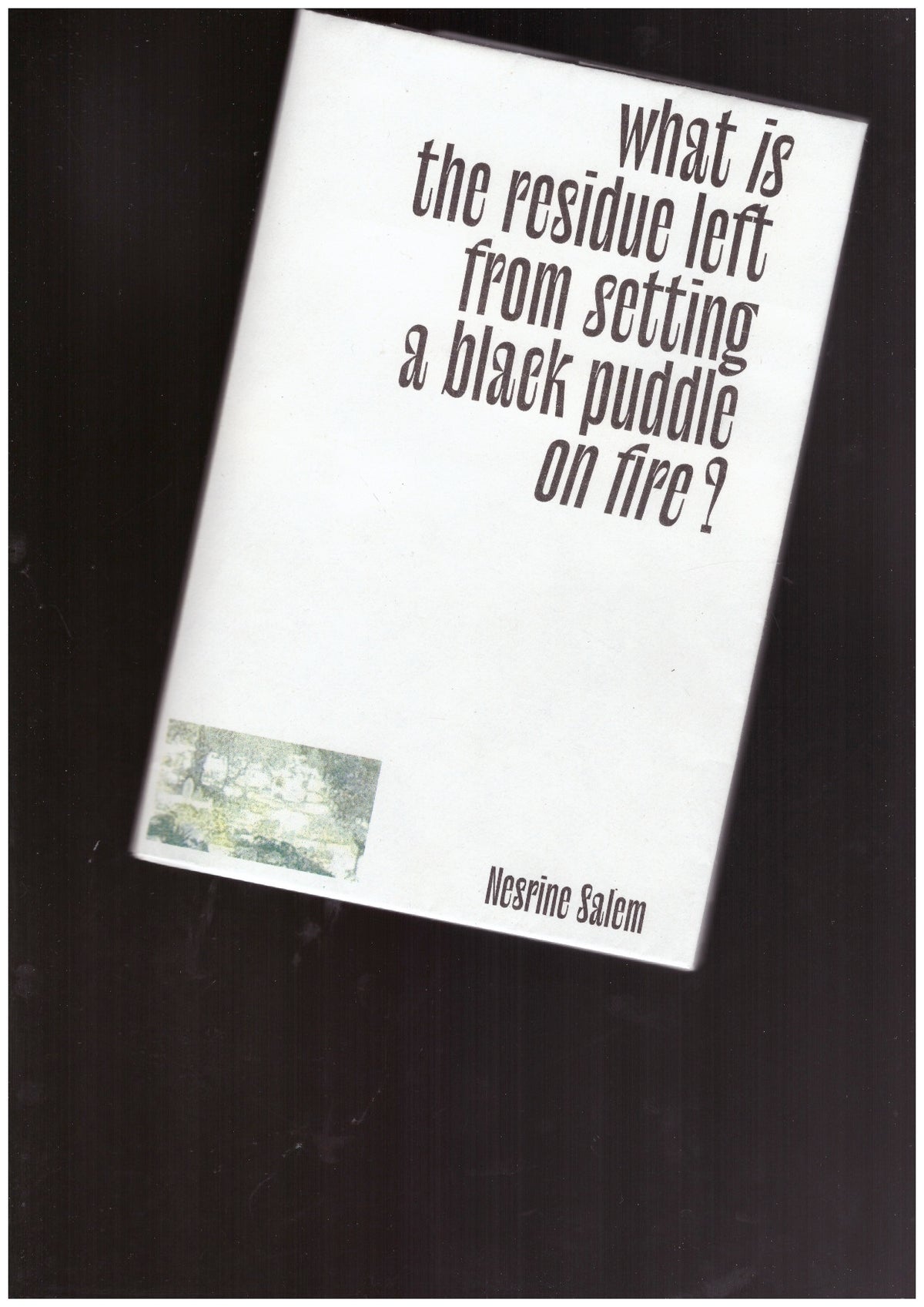What is the residue left from setting a black puddle on fire ?